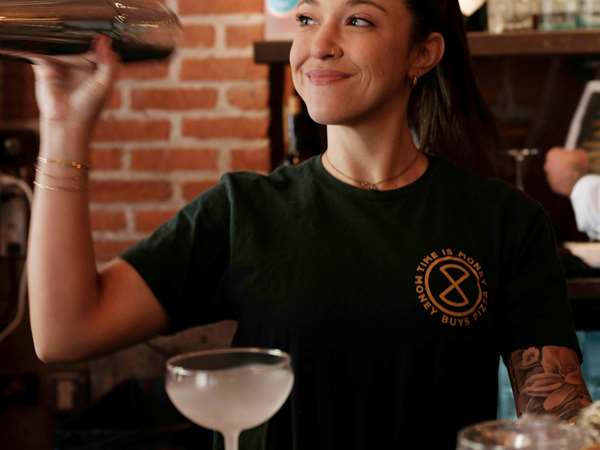 bartender shaking a cocktail