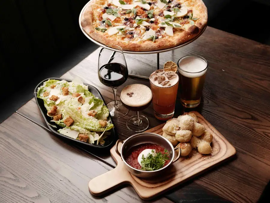 salad, pizza, garlic knots, and beverages at Far Corner