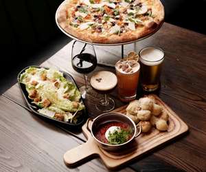 salad, pizza, garlic knots, and beverages at Far Corner