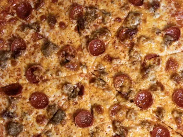 Meat Lovers Close-up of meat lovers pizza with pepperoni and sausage