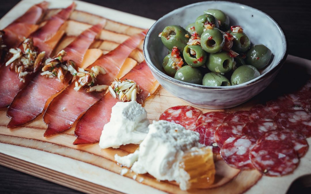 Charcuterie board with olives and cheese - Far Corner